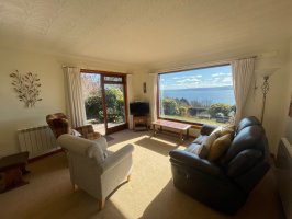Living room with stunning views over the Moray Firth
