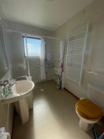 Main shower room with accessible shower