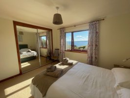 Master bedroom with views over the Moray Firth